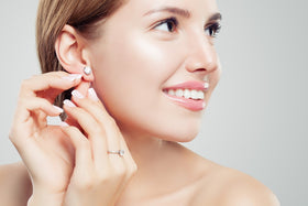 Earrings worn beside the face