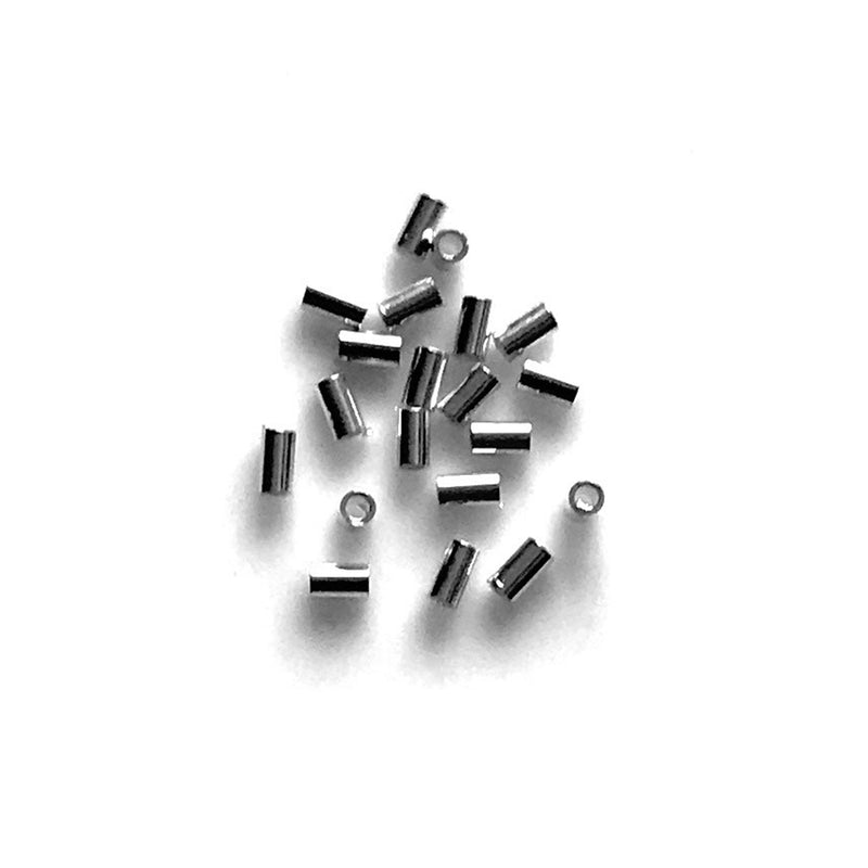 20-Pack of 1.1mm x 2mm x 0.8mm Sterling Silver Crimp Tubes on white background