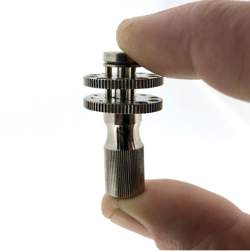 Spring-loaded clamp with 0.6mm - 3mm capacity for watch hands and small components