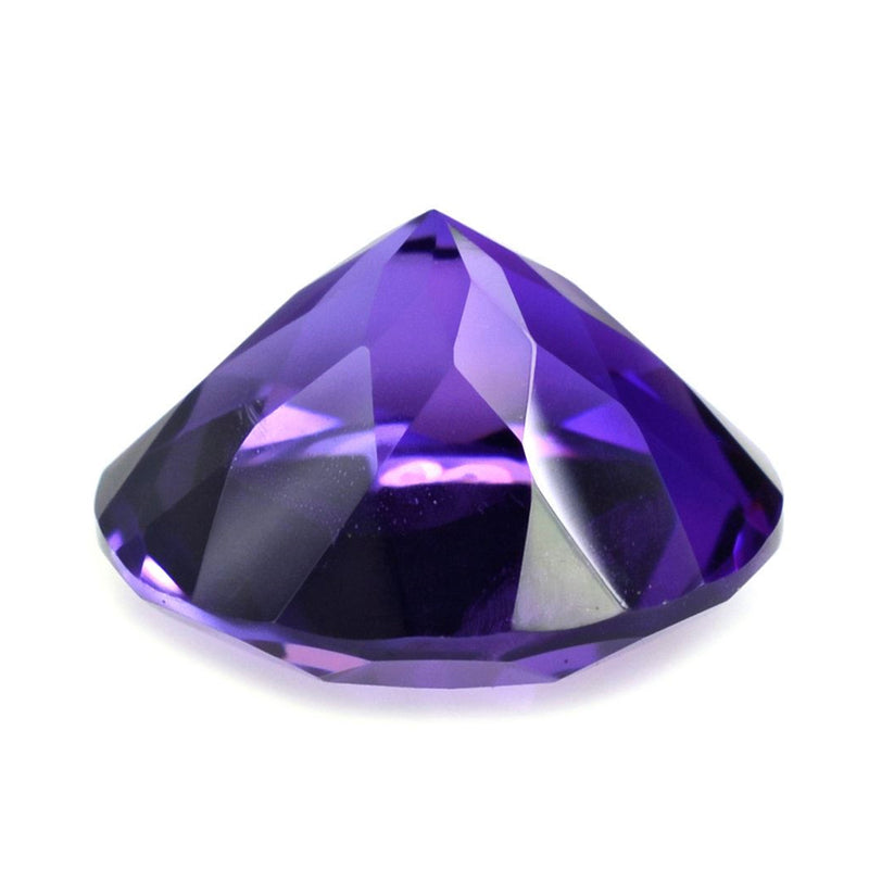 Close-up of richly colored Amethyst 5.5mm Round Cut Natural Purple Gemstone